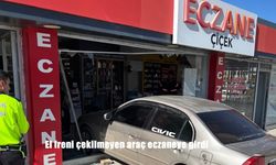 El freni çekilmeyen araç eczaneye girdi