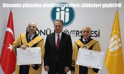 Unvanda yükselen akademisyenlere cübbeleri giydirildi