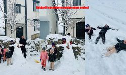 Hakkarili çocukların kardan adam sevinci