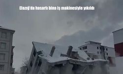Elazığ'da hasarlı bina iş makinesiyle yıkıldı