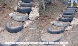 Köylüler Ramazan’da camiye ulaşmak için lastikten merdiven yaptılar