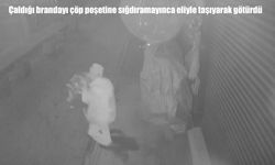 Elazığ’da hırsızın zor anları kamerada: Çaldığı brandayı çöp poşetine sığdıramadı