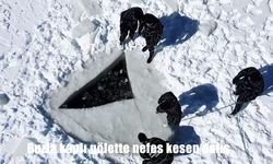 Buzla kaplı gölette nefes kesen dalış