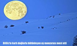 Bitlis'te karlı dağlarla bütünleşen ay manzarası mest etti