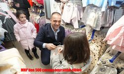 MHP Erzurum İl Başkanlığı’ndan anlamlı bayram desteği: 500 çocuğa bayramlık elbise