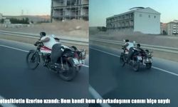 Motosikletin üzerine uzandı: Hem kendi hem de arkadaşının canını hiçe saydı