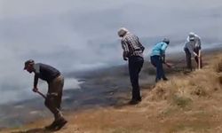 Yüksekova'da tarım arazisindeki yangında bin balya ot yandı