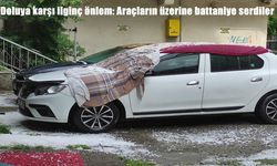 Ardahan'da doluya karşı ilginç önlem: Araçların üzerine battaniye serdiler