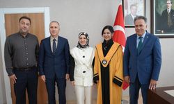 İnönü Üniversitesinde iki akademisyene cübbe giydirildi