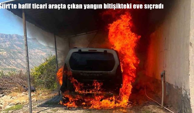 Siirt'te park halindeki araç alev aldı, yangın eve sıçradı